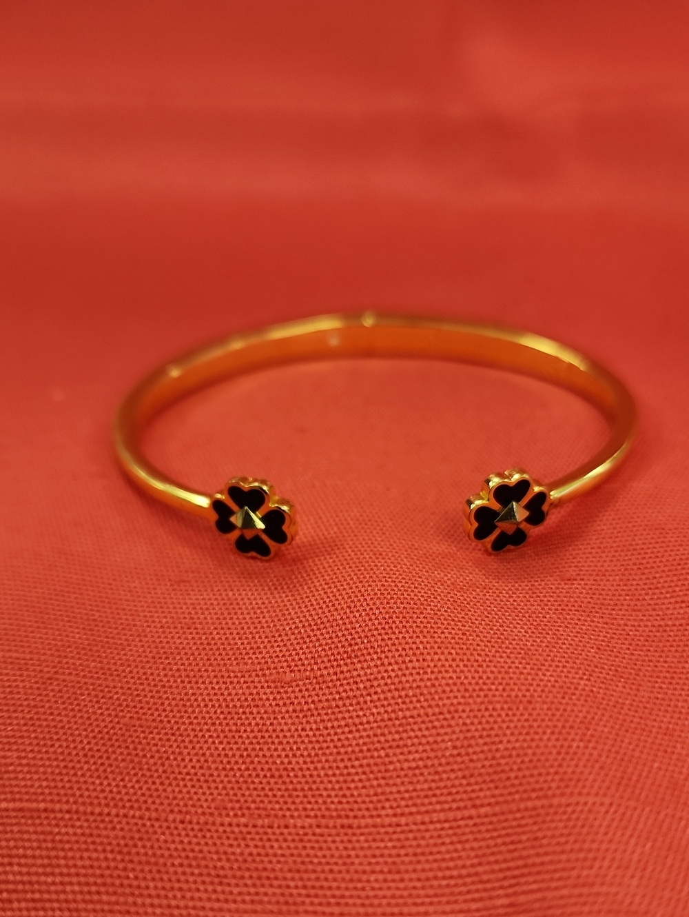 Kate Spade Gold Open Bangle Bracelet with Black Clover Accents